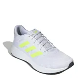 Championes de running Adidas modelo Response Runner, color blanco con detalles en amarillo neón. Presentan una estructura de malla transpirable, cierre con cordones y mediasuela de EVA para mayor amortiguación.