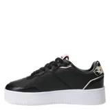 Championes urbanos Topper modelo Terre Print, color negro con plataforma blanca. Presentan una combinación de texturas en la capellada, incluyendo detalles con efecto reptil, y cordones negros. La lengüeta tiene un detalle en color rosado.