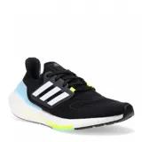 Championes Adidas Ultraboost 22 de mujer, color negro con detalles en blanco y celeste.