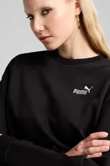 Buzo Puma de cuello redondo color verde, con diseño relaxed y el logo de la marca bordado en blanco en el pecho.