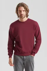 Buzo deportivo de corte clásico y escote redondo, confeccionado en tejido de algodón y poliéster. Presenta puños y ruedo acanalados, con un diseño minimalista y versátil.