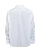 Camisa de manga larga RKF con estampado de cuadros finos en tonos azul y negro sobre fondo blanco. Presenta cuello americano abotonado, cierre frontal con botones, puños con doble botón y bolsillo en el pecho con el logo de la marca bordado.