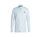 Remera de entrenamiento Adidas color celeste con cierre parcial y logo en el pecho.