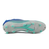 Championes de fútbol Diadora modelo Ecliptic MD, color azul con degradado a aguamarina y logo en blanco.