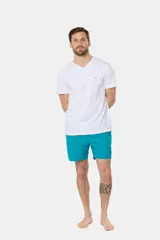 Short de baño negro liso, con cintura elástica y cordón regulable, dos bolsillos laterales y suspensor de malla fina.