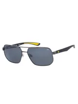 Lentes de sol Caterpillar modelo CTS 8013 para hombre, con armazón de metal gris y doble puente, patillas negras con detalles en amarillo y micas polarizadas oscuras.