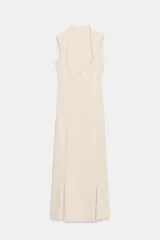 Vestido midi verde lima, sin mangas, con escote corazón y bajo evasé.