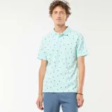 Chomba celeste con estampado de palmeras en color negro.