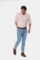 Pantalón de jean skinny celeste con spandex, tiro medio y corte ajustado.