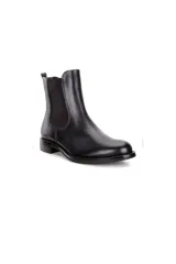 Bota Chelsea de cuero negro, con elásticos laterales y suela de goma. Taco bajo de 25mm. Diseño slip-on.