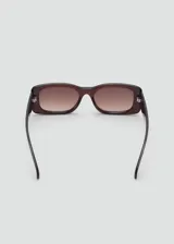 Lentes de sol Nimes con armazón rectangular de policarbonato en tono marrón oscuro y cristales degradados.