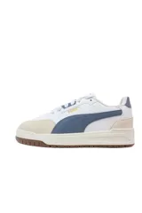 Championes Puma Shuffle Downtown, color blanco con detalles en beige, azul y suela de goma marrón.
