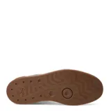 Championes Puma Club II Indoor, color negro con detalles en blanco y suela de goma color caramelo. Presentan un diseño acolchado en la puntera y el logo de la marca en dorado.