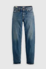 Pantalón de jean azul de tiro medio, con corte holgado y diseño taper.