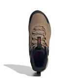Championes de trekking Adidas Terrex Anylander Mid, de caña media, color marrón con detalles en negro. Presentan diseño robusto con refuerzos en la puntera y talón, cordones ajustables y suela con relieve para mayor tracción.