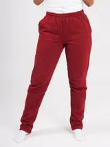Pantalón deportivo rojo oscuro de corte recto, tiro alto y cordones ajustables en la cintura.