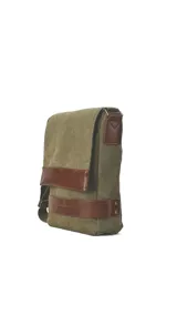 Morral versátil de tela canvas gris con detalles en cuero sintético marrón. Cuenta con tapa frontal con broches magnéticos, bolsillo tipo guantera bajo la tapa, división interna desmontable con velcro y correa larga regulable.