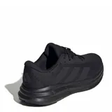Championes de running Adidas modelo Galaxy 7, color negro. Presentan un diseño de malla transpirable con las icónicas tres tiras laterales y tecnología de amortiguación Cloudfoam en la mediasuela para mayor confort.