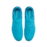 Championes de fútbol Nike Phantom GX 2 Academy FG, con capellada blanca y detalles en negro. Presentan el logo de Nike en dorado y cordones blancos. Ideales para superficies naturales y sintéticas.