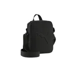 Bandolera Puma Buzz de color negro, diseñada con un compartimento principal con cierre, asa de mano superior y correa ajustable para el hombro. Presenta el logotipo de la marca en relieve en la parte frontal.