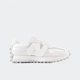 Championes New Balance modelo 327, color blanco, con detalles en gamuza y malla. Presentan el logo 'N' sobredimensionado en el lateral y suela dentada de goma.