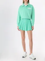 Buzo polo deportivo Prince bordado en menta con logo en blanco. Fabricado con 100% algodón, preencogido y de calce holgado con largo corto.