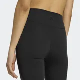 Calza deportiva Adidas All Me Essentials Flare de tiro alto y diseño acampanado en las pantorrillas, color negro, confeccionada en tejido de punto elástico con tecnología Climacool.