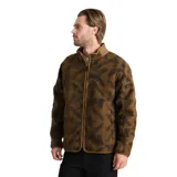 Campera de polar tipo sherpa con cierre frontal completo, cuello alto y estampado jacquard geométrico en tonos marrones. Cuenta con bolsillos laterales con cierre y paneles reforzados.