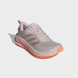 Championes de running Adidas Supernova Ease 2, color lila con detalles en naranja. Presentan un empeine de malla técnica ligera, lengüeta acolchada y mediasuela con tecnología DREAMSTRIKE para mayor amortiguación.