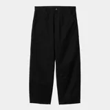 Pantalón negro de lona Marshall, corte holgado y talle regular, con paneles anchos en las rodillas, triple costura, bolsillos para herramientas y presilla para martillo.