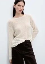 Jersey de punto calado con cuello barco y manga larga, de diseño recto y corte holgado.