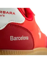 Championes deportivos para mujer Santa Barbara modelo Chillw, de color azul marino con suela de goma marrón y detalles en blanco.