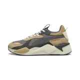 Championes urbanos Puma modelo RS-X Suede, con diseño de paneles en tonos gris, tostado y crema. Presentan una silueta robusta con tecnología RS Running System en la entresuela, combinando malla y gamuza en su construcción.
