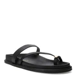 Sandalias planas de mujer color negro, con diseño de tiras finas y detalle de herraje metálico dorado en la tira que cruza el dedo. Plantilla acolchada y suela plana.