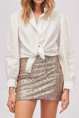 Minifalda ajustada color dorado/cobre cubierta de lentejuelas.