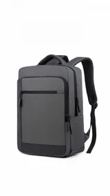 Mochila urbana de diseño minimalista en color gris, con compartimento principal, bolsillo frontal con cierre, puerto USB integrado y espalda acolchada.