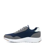 Championes deportivos Umbro Volcan II para hombre, en color azul marino con inserciones de gamuza sintética gris, detalles blancos y suela de goma con base tostada.