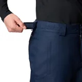 Pantalón de esquí y deportes de nieve color azul marino, con tecnología impermeable Omni-Tech y forro térmico reflectante Omni-Heat. Cuenta con cintura ajustable, bolsillos con cierre, polainas internas y refuerzos en la parte inferior de las piernas.