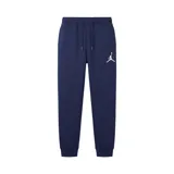 Pantalon de jogging Nike Jordan, color azul marino, con cintura elástica ajustable con cordón, puños elásticos en los tobillos y logo Jumpman bordado en blanco en el muslo izquierdo.
