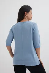 Sweater color marrón con escote en V y mangas 3/4.