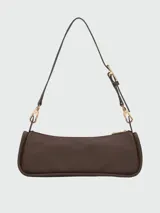 Cartera de hombro Longchamp modelo Looong en tamaño pequeño, confeccionada en cuero de color marrón oscuro. Presenta una silueta estructurada y minimalista con correa de hombro fija.