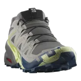 Championes Salomon Speedcross 6 de color negro, diseñados específicamente para trail running. Presentan una estructura robusta y técnica, capellada sintética y textil con refuerzos termosellados, sistema de cordones de ajuste rápido Quicklace y suela con tacos profundos para máxima tracción en terrenos difíciles.