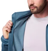 Campera de polar con cierre frontal completo, cuello alto y bolsillo vertical con cierre en el pecho. Confeccionada en tejido técnico hidroabsorbente con textura de rejilla.