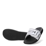 Sandalias tipo ojota Puma modelo Royalcat Comfort 2, con base negra y tira superior blanca con el logo de la marca en negro. Cuenta con tecnología Softride en la suela para mayor comodidad.