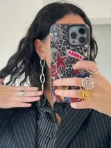 Aros largos plateados con eslabones ovalados en cadena.