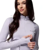 Remera deportiva de manga larga Columbia con cierre frontal parcial, cuello alto y orificios para pulgares en los puños. Confeccionada con tecnología Omni-WICK para control de humedad y neutralización de olores.