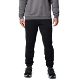 Pantalón tipo jogger de color negro, confeccionado en una mezcla de algodón, con cintura elástica ajustable mediante cordón interior, bolsillos laterales y traseros, y puños elásticos en los tobillos.