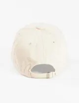 Gorra de gabardina color crudo con bordado verde de la palabra "Vintage" en el frente.