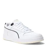 Championes urbanos Puma modelo RBD Game Low, color blanco con detalles en negro. Presentan un diseño inspirado en el básquetbol con perforaciones en la puntera, el logo de la marca en la lengüeta y la franja característica en los laterales. Cuentan con suela de goma con efecto envejecido.