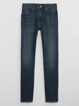 Jean de corte skinny, color azul oscuro con efecto de lavado localizado, confeccionado en denim con tecnología Softmax para mayor flexibilidad y comodidad.